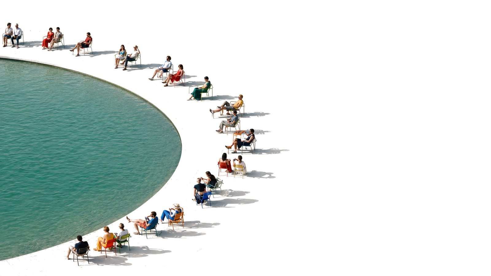 People seated in a curve around a pool